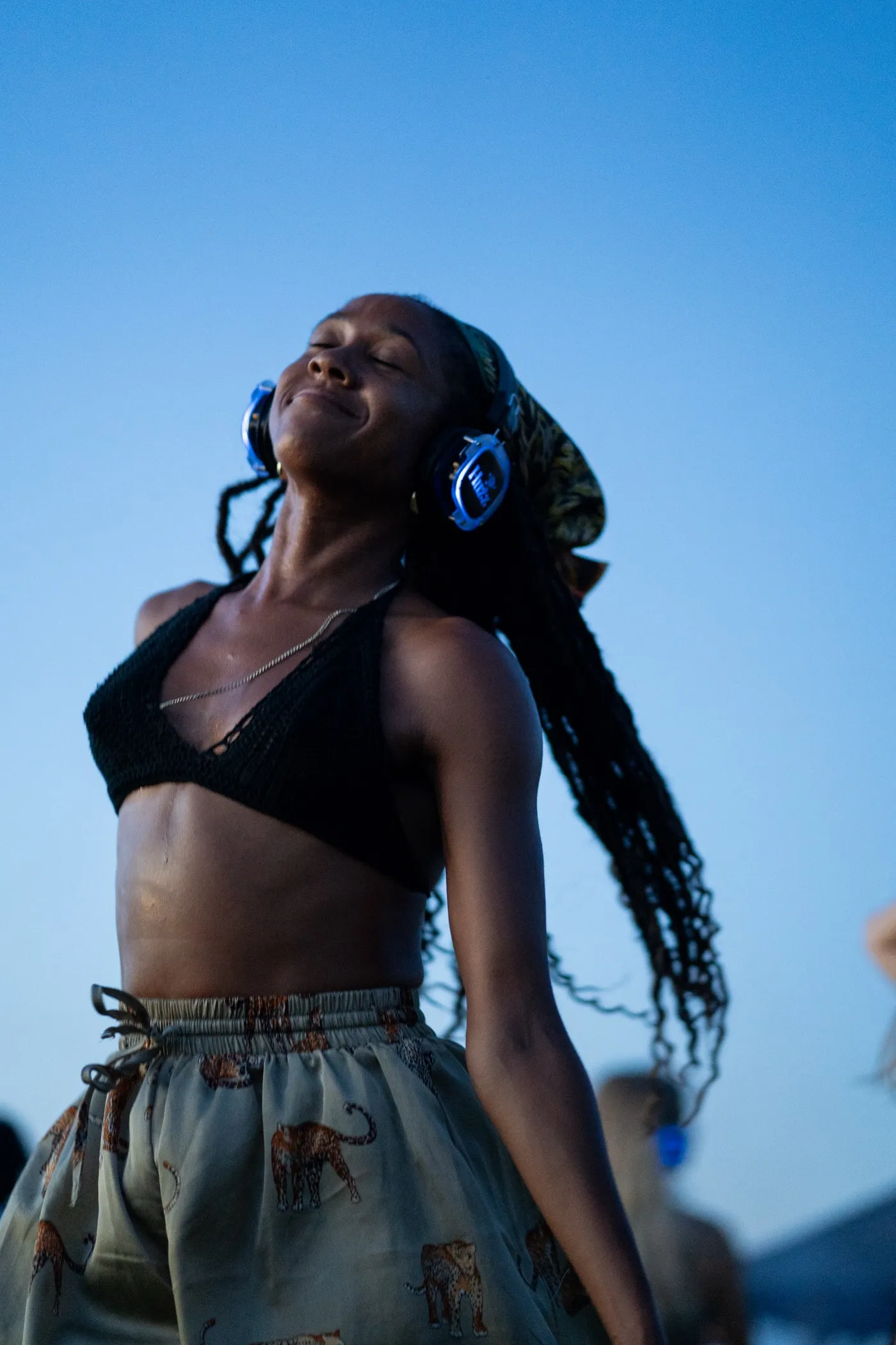 Silent disco headphones at a dance event on the beach